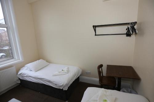 Habitación Doble - 2 camas del hotel Charlies. Foto 6