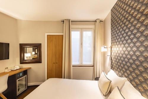 Habitación Doble Estándar del hotel Best Western Aramis Saint germain. Foto 5