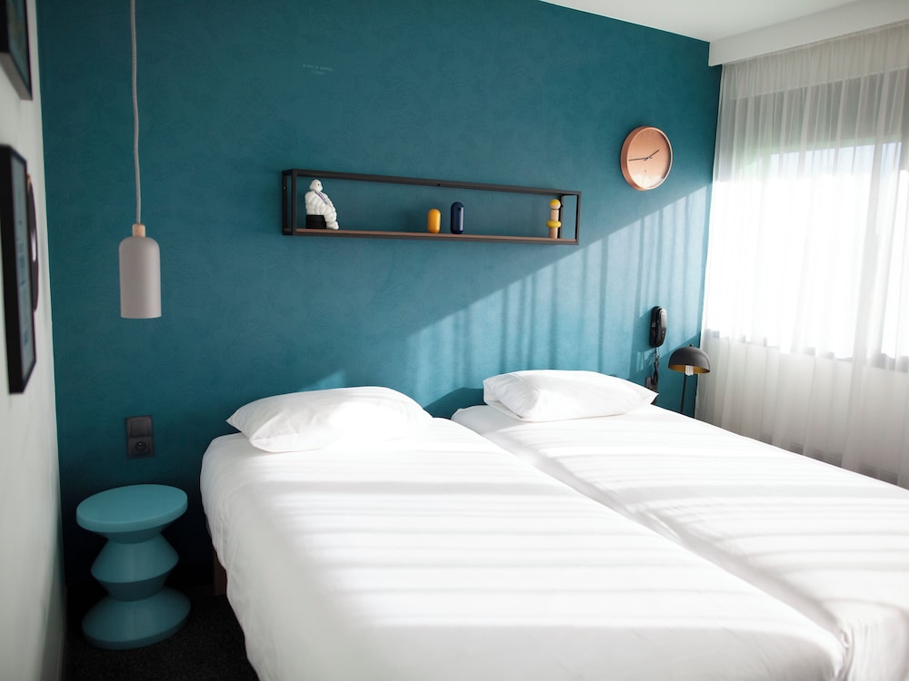 Habitación estándar con dos camas individuales del hotel Ibis Styles Clermont-ferrand Gare. Foto 2