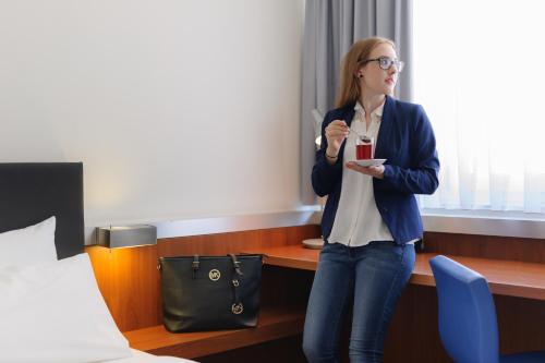 MyRoom by Astrid con 1 cama queen size del hotel Novotel Erlangen. Foto 5