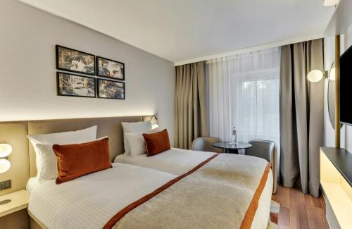 Habitación Doble Confort - 2 camas del hotel Leonardo Hannover Medical Park. Foto 3