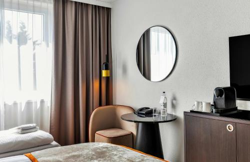 Habitación Triple Superior del hotel Leonardo Hannover Medical Park. Foto 5