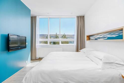 Suite con cama extragrande del hotel Akureyri - Berjaya Iceland Hotels. Foto 1