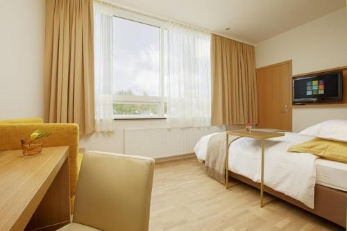 Habitación con cama grande del hotel Akureyri - Berjaya Iceland Hotels. Foto 3