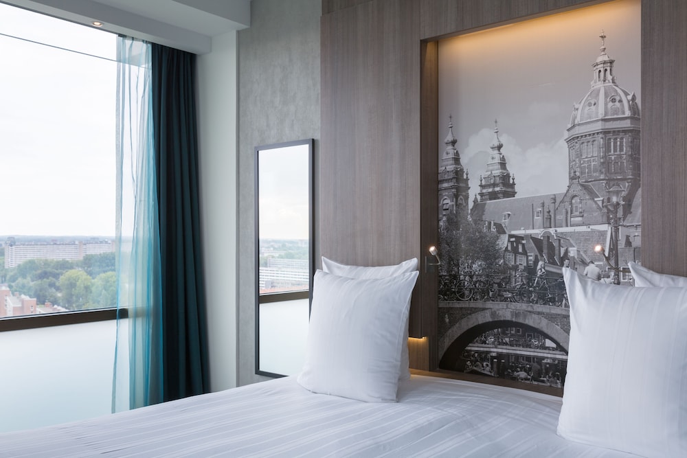 Habitación Deluxe, 1 cama de matrimonio grande del hotel Leonardo Amsterdam Rembrandtpark. Foto 1