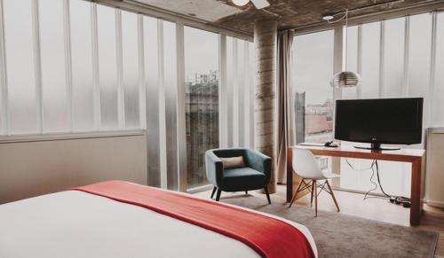 Habitación Superior esquinera con cama extragrande del hotel Nolitan Hotel. Foto 1