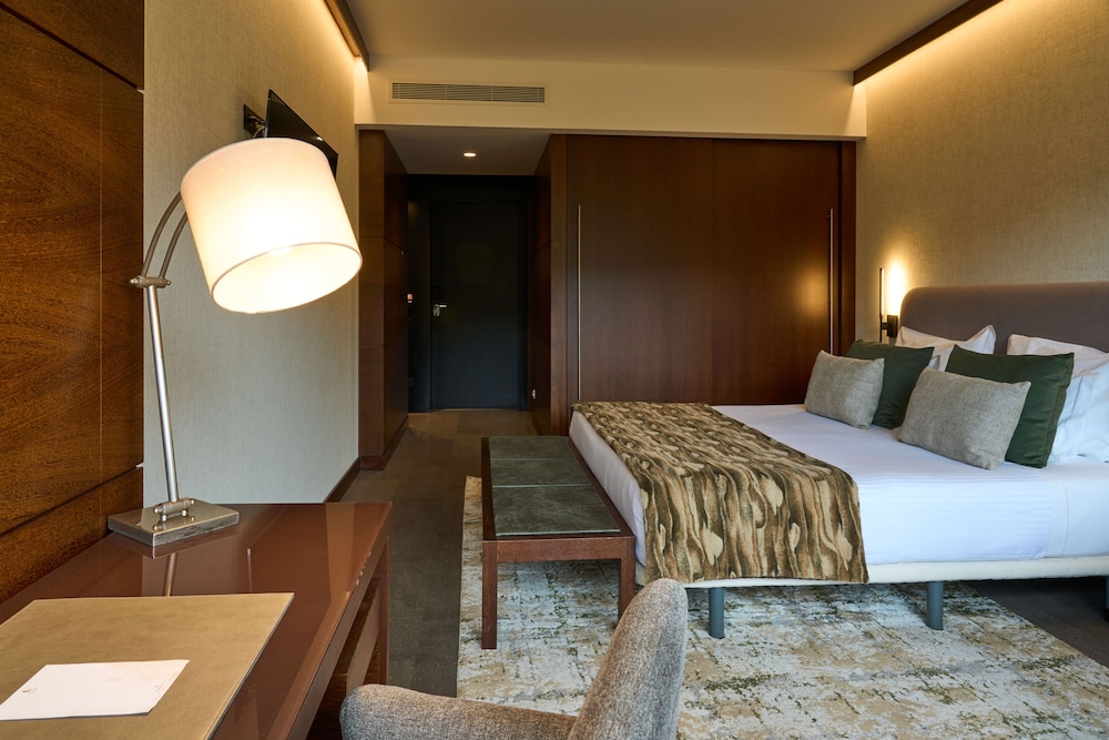 Habitación con 2 camas individuales del hotel H2otel Congress and Medical Spa. Foto 1