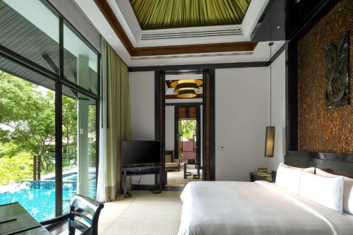 Villa Wellbeing Sanctuary con piscina y vistas parciales al océano del hotel Banyan Tree Samui