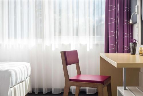2 camas individuales del hotel Lindner Frankfurt Sportpark, Part Of Jdv By Hyatt. Foto 3