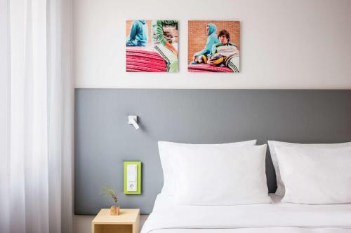 2 camas individuales del hotel Lindner Frankfurt Sportpark, Part Of Jdv By Hyatt. Foto 8