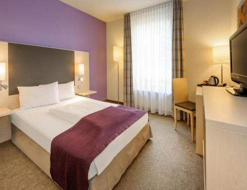 Habitación Superior - 1 cama grande del hotel Mercure Berlin City West. Foto 1