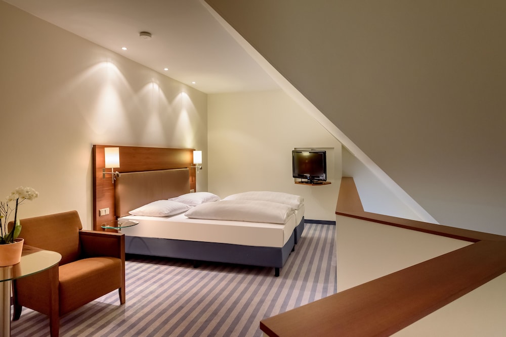 Suite Junior con cama doble del hotel Sunday München Airport Freising