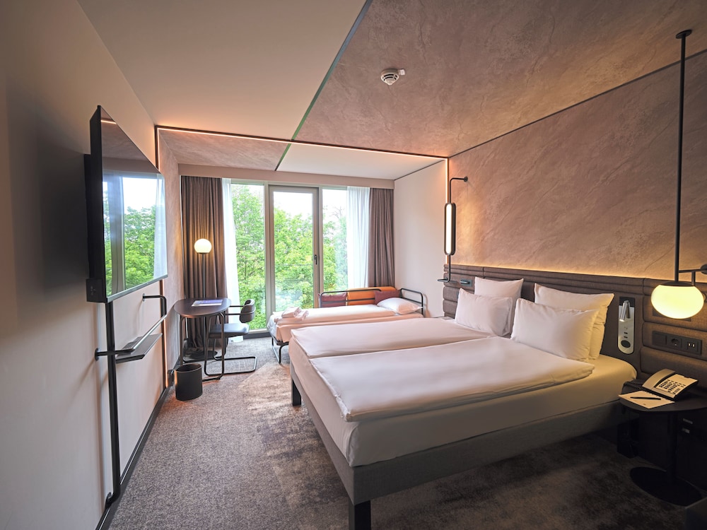 Habitación Familiar Premium del hotel Novotel Munich City. Foto 1