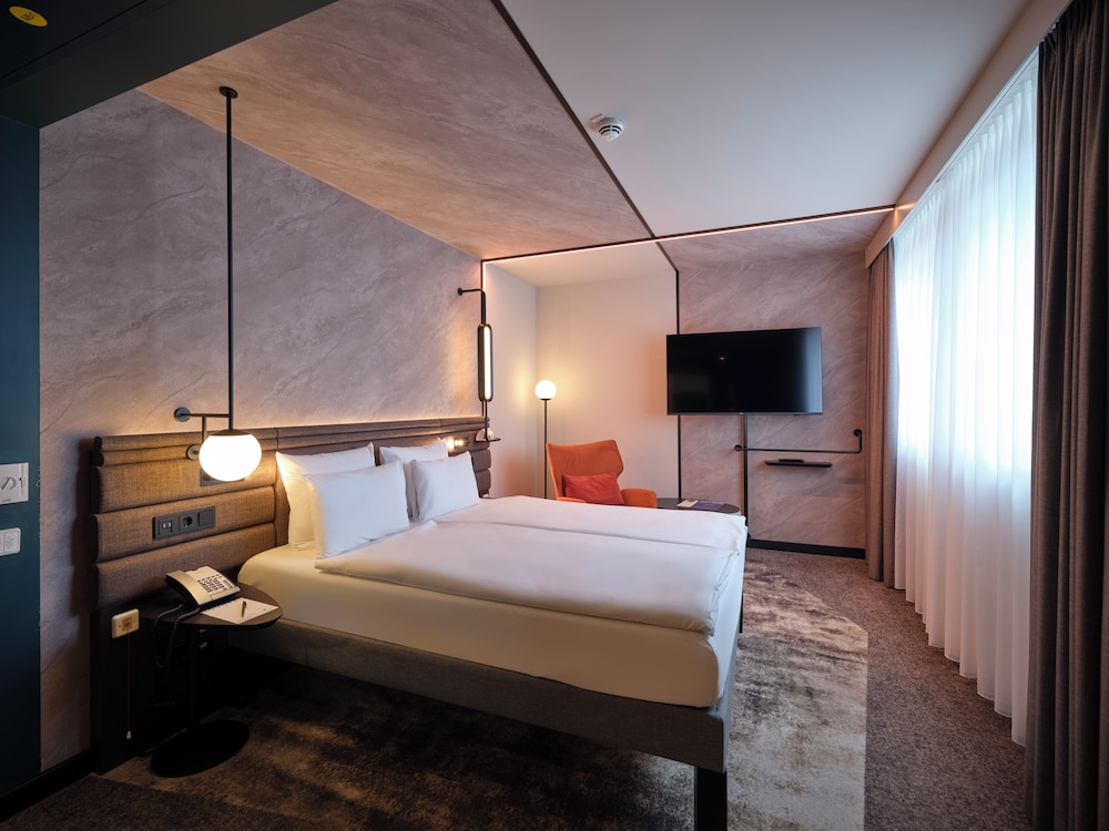 Habitación Familiar Premium del hotel Novotel Munich City. Foto 2