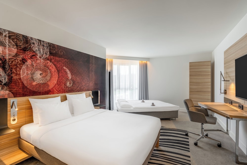 Habitación Familiar Ejecutiva del hotel Novotel Munich City. Foto 1