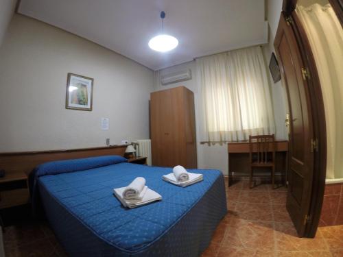 Habitación Doble - 1 o 2 camas del hotel El Pilar. Foto 33