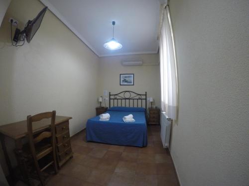 Habitación Doble - 1 o 2 camas del hotel El Pilar. Foto 38