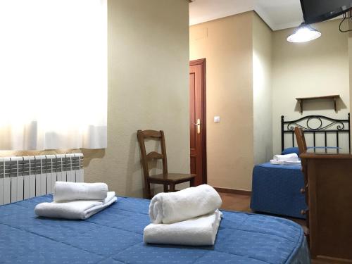 Habitación Triple del hotel El Pilar. Foto 3