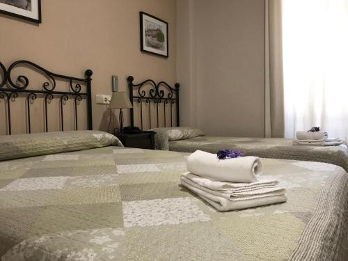 Habitación Triple del hotel El Pilar. Foto 4