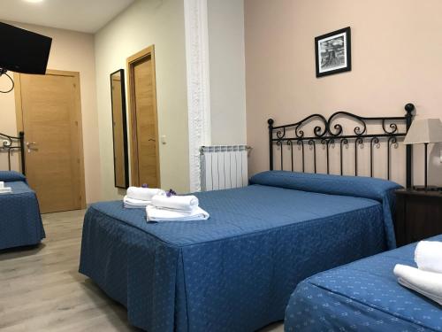 Habitación Triple del hotel El Pilar. Foto 18