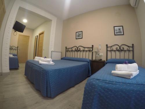 Habitación cuádruple del hotel El Pilar. Foto 12