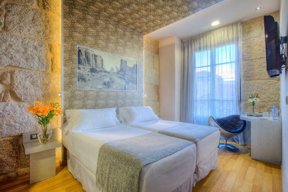 Habitación familiar del hotel Nh Ourense. Foto 3