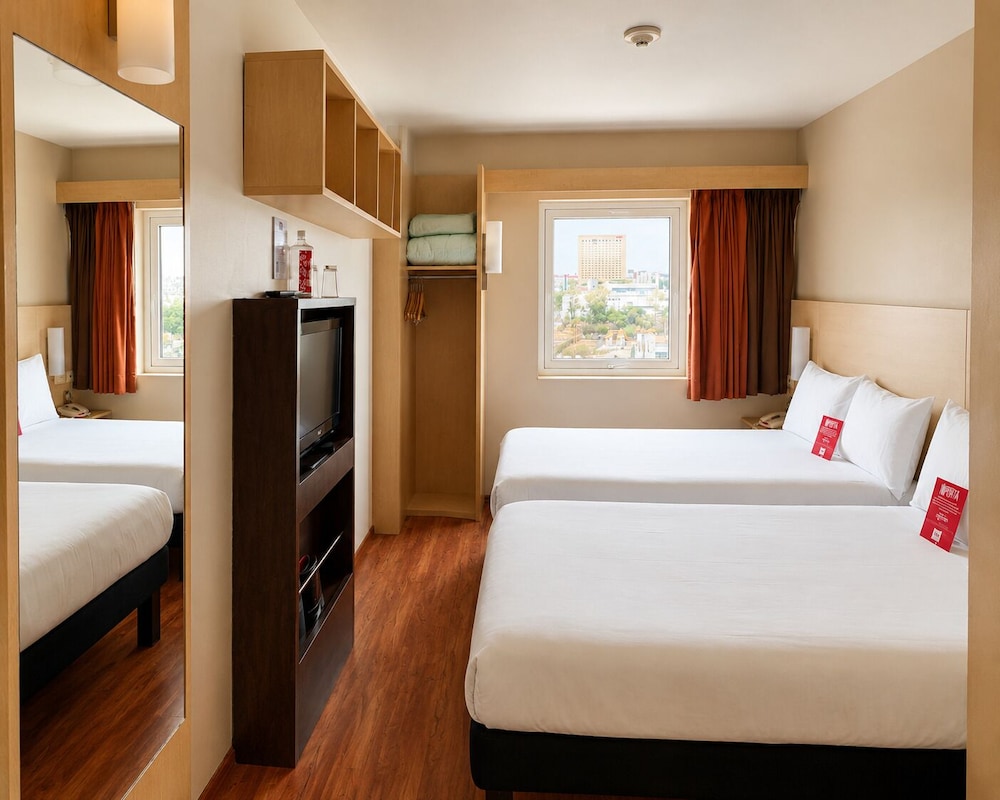 Habitación estándar doble, 2 camas individuales del hotel Ibis Aguascalientes Norte. Foto 9