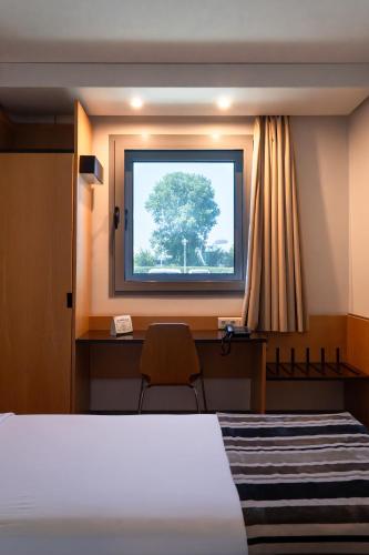 Habitación Doble Estándar del hotel Park Porto Aeroporto. Foto 1