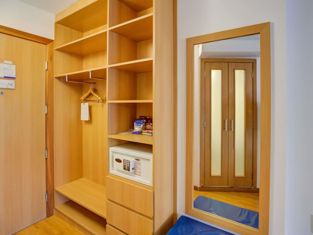 Habitación de categoría superior con 2 camas individuales del hotel Novotel Rj Santos Dumont. Foto 5