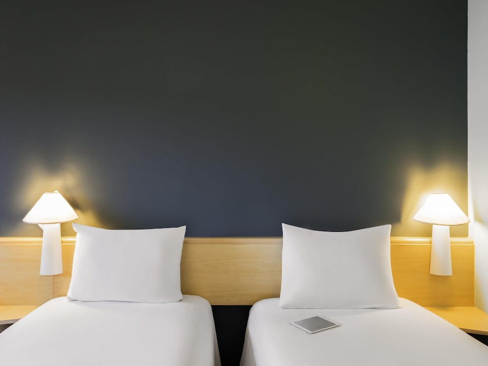 Habitación estándar con camas individuales del hotel Ibis Mexico Perinorte. Foto 3