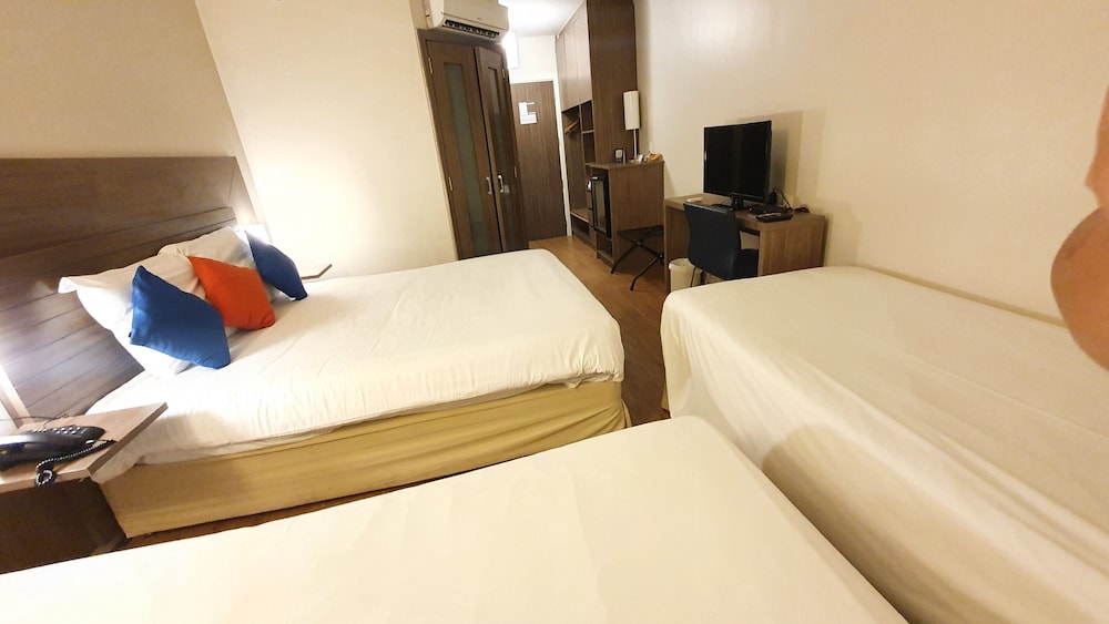 D3B - Habitación familiar con 1 cama doble y 2 camas individuales del hotel Novotel Manaus. Foto 1