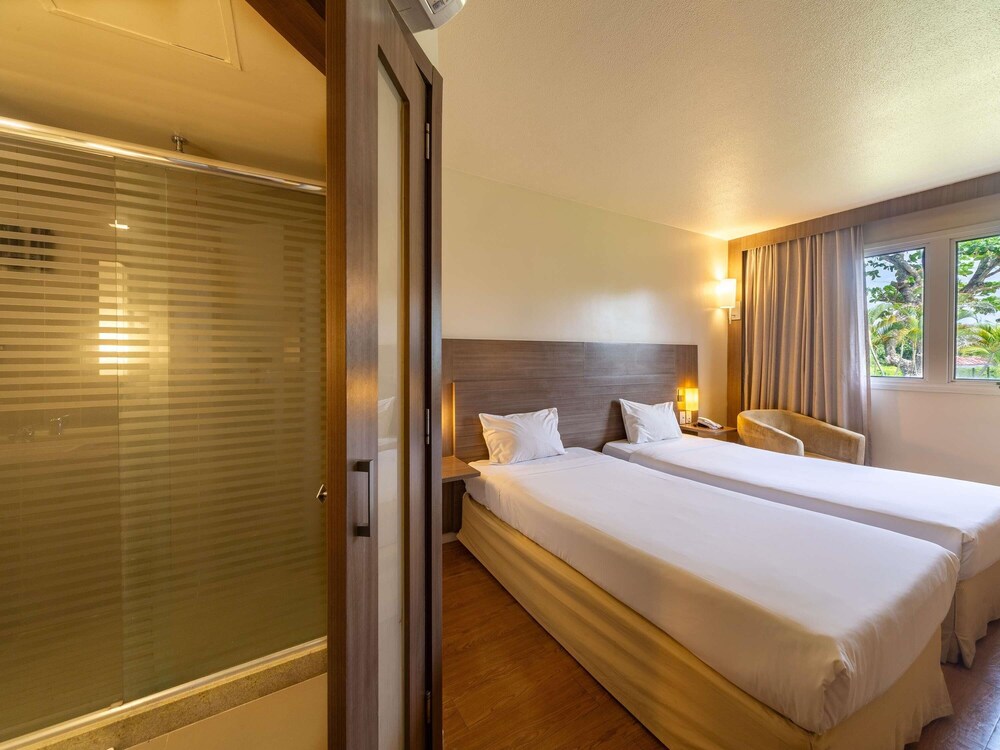 Habitación superior con 2 camas individuales del hotel Novotel Manaus. Foto 5