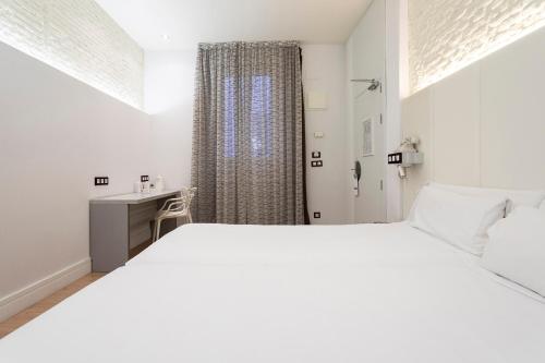 Habitación Doble - 1 o 2 camas del hotel Petit Palace Lealtad Plaza. Foto 4