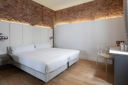 Habitación Familiar del hotel Petit Palace Lealtad Plaza. Foto 13
