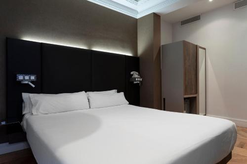 Suite Junior con terraza del hotel Petit Palace Lealtad Plaza. Foto 7