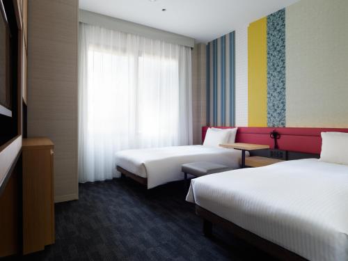 Habitación Doble adaptada para personas de movilidad reducida - 2 camas - No fumadores del hotel Mitsui Garden Kyoto Shijo