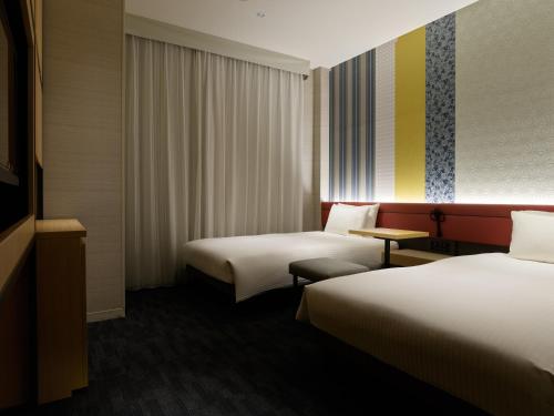 Habitación Doble adaptada para personas de movilidad reducida - 2 camas - No fumadores del hotel Mitsui Garden Kyoto Shijo. Foto 4