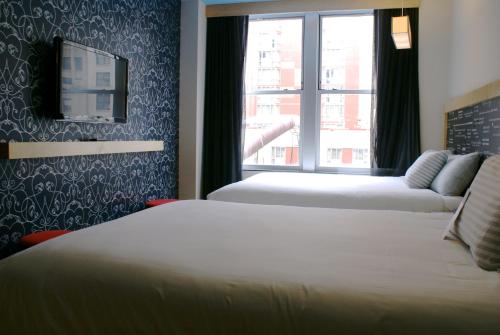 Habitación Premium del hotel TRYP by Wyndham New York City Times Square / Midtown. Foto 2