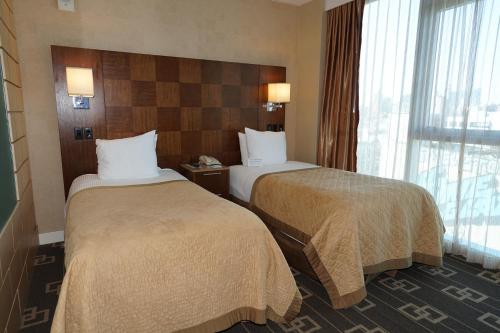 Habitación Doble Superior - 2 camas - Planta superior del hotel Wyndham Garden Chinatown. Foto 3