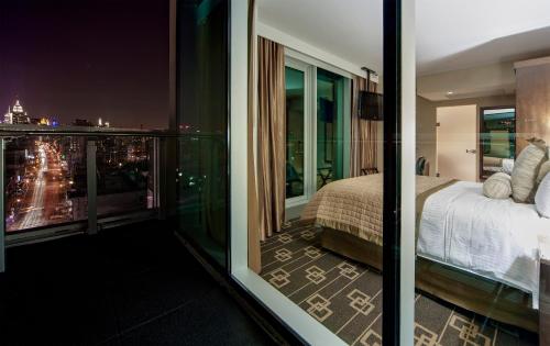 Suite de 1 dormitorio con cama grande - Planta superior del hotel Wyndham Garden Chinatown