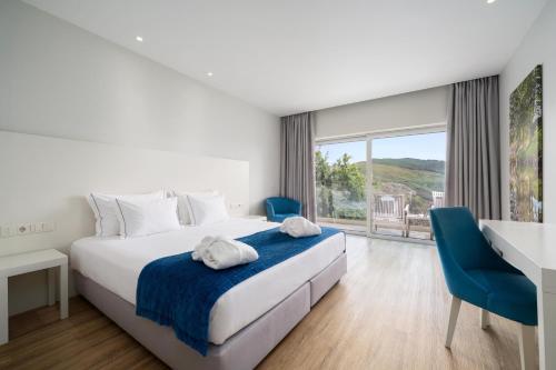Habitación Doble Deluxe - Solo adultos - 1 o 2 camas del hotel Água Hotels Mondim De Basto. Foto 1