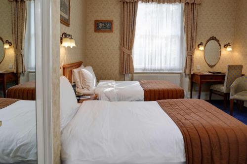 Habitación Doble Estándar - 2 camas del hotel Best Western Swiss Cottage. Foto 2