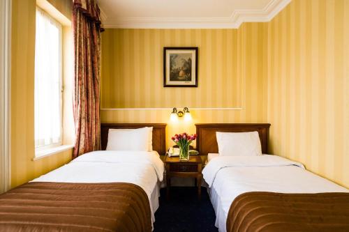 Habitación Doble Estándar - 2 camas del hotel Best Western Swiss Cottage. Foto 5