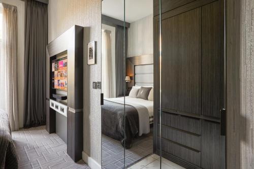 Habitación Estándar - Cama extragrande del hotel Eccleston Square. Foto 1