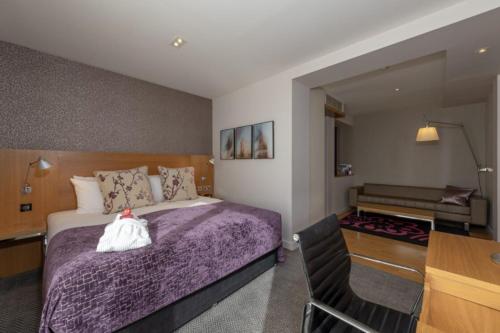 Habitación Deluxe King con balcón del hotel Apex Temple Court. Foto 4