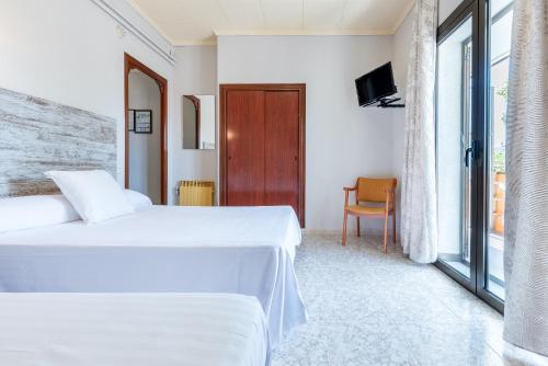 Habitación Doble con Cama supletoria del hotel Canadá. Foto 2