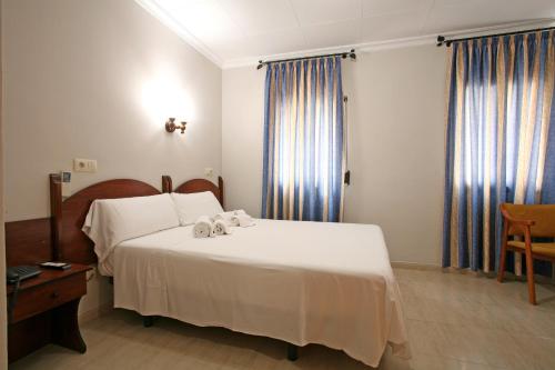 Habitación adaptada para personas con movilidad reducida - Cama grande del hotel Canadá