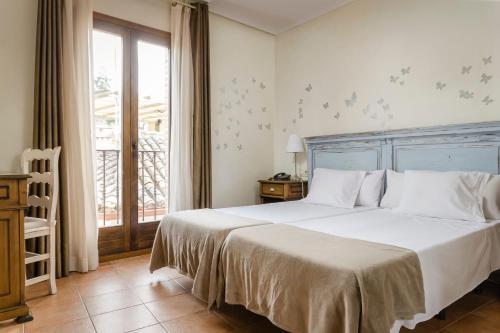 Habitación Doble - 1 o 2 camas del hotel Yit Puerta Bisagra. Foto 11