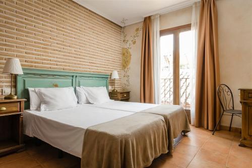 Habitación Doble - 1 o 2 camas del hotel Yit Puerta Bisagra. Foto 12