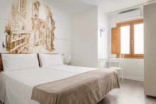 Habitación Doble - 1 o 2 camas del hotel Yit Puerta Bisagra. Foto 13